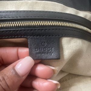 Gucci shoulder bag. Black with duster bag.